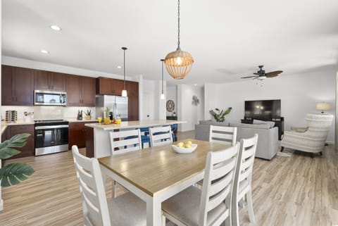 Dining table with seating for 6 is perfect for group meals or games.