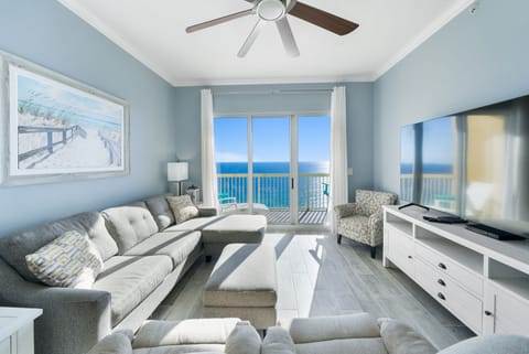 Sink into plush coastal comfort while soaking up breathtaking ocean views from your private balcony retreat.