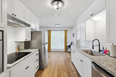 This fully equipped kitchen with plenty of counter space and cabinets is where memories are made, family dinners are shared, and culinary adventures unfold!