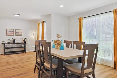 From the pops of greenery and designer lighting to the open dining space and natural sunlight, this dining space offers the best of function and fashion for you to enjoy your meals!