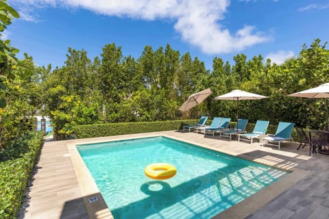 The pool and sunloungers