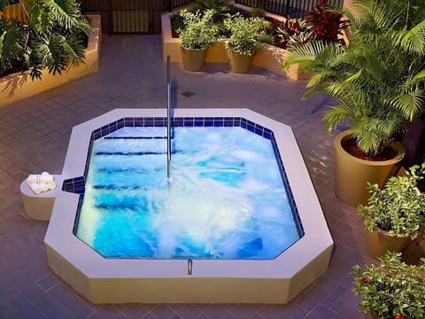 Sink into the bubbling hot tub for deep relaxation.