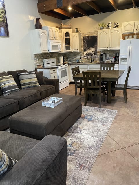 Living room, dining area & full kitchen.