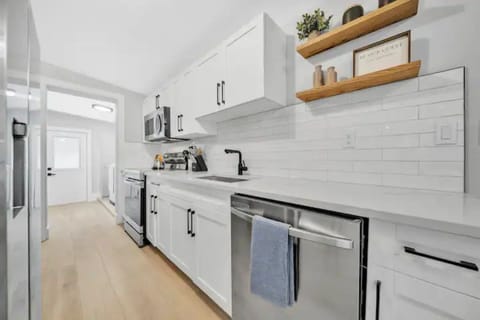 Our brand new kitchen is stocked with everything you need to cook or eat in .