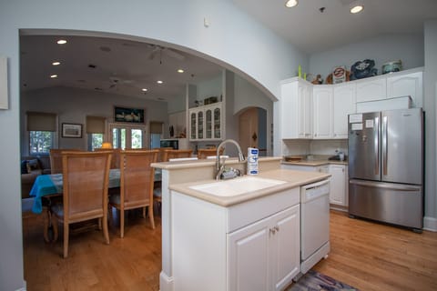 Kitchen, 2nd floor, 2 seats at bar, coffee pot, access to back screened porch