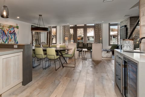 Unit F - Great room with a wet bar with two-zone wine fridge