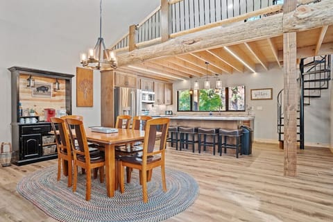 Open and spacious layout that seamlessly integrates the dining and kitchen areas, providing ample room for all your culinary and dining needs.