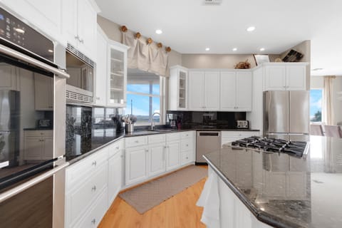 Large kitchen with new gas stove