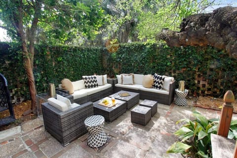 Private Outdoor Courtyard | Round Dining Table Seats 6 | Sectional Seating Seats 6–7 | First Floor