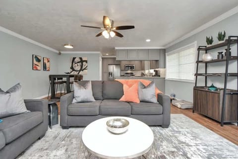 Enjoy the open floor plan of the living room that seamlessly flows into the kitchen & dining area, making it the perfect space for entertaining friends & family. Gather together in a warm, inviting atmosphere where memories, and good food, are made!