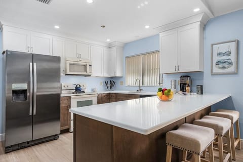 Pull up a bar stool and chat with the chef!