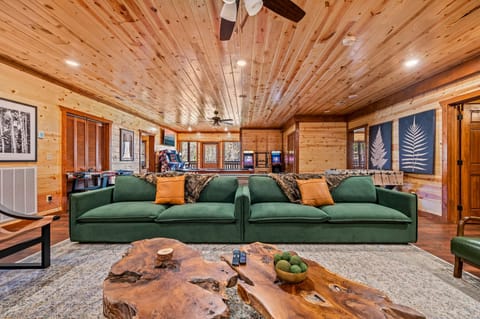 Epic game room with 86" 4K TV perfect for movie blockbusters, or streaming.