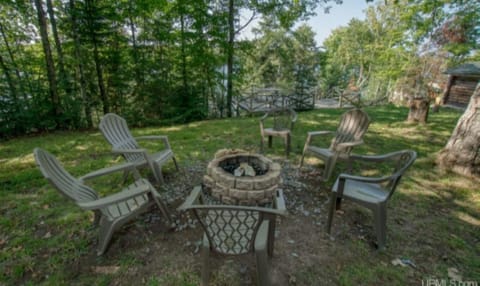 fire pit, deck and lake view