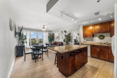 Living Area with Lake/Light Show Views, Flat Screen TV, Sleeper Sofa and Private Balcony Access