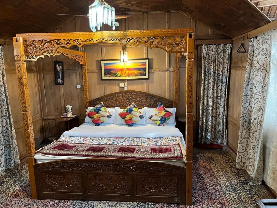 Young Shahzada Group of Houseboats Docked boat in India