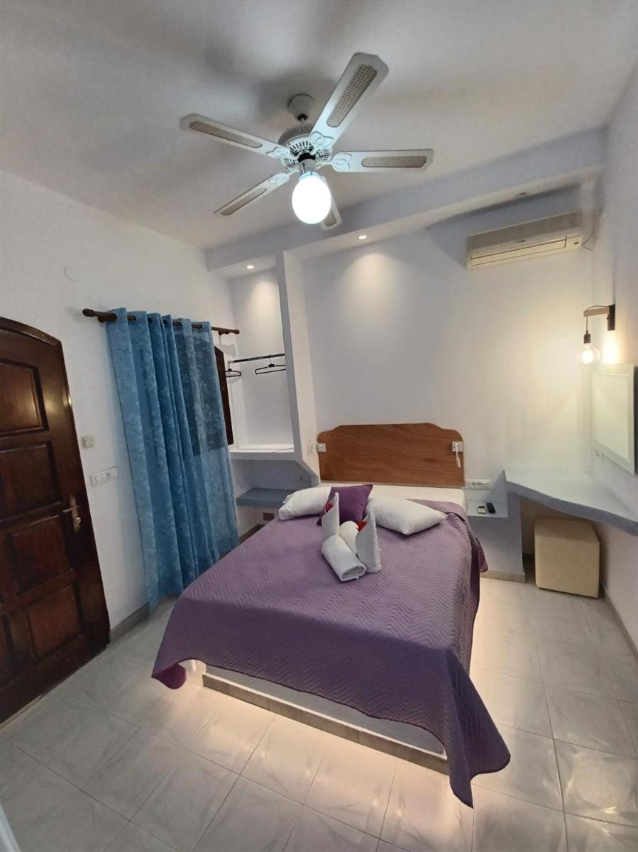 Evelina Beach Pension means vacation beside the sea, Who wants to swim in a box of chemicals, Swimming in the sea,There is nothing like a morning walk on a beach Beachlife definitely has a different vibe Bed and Breakfast in Perissa