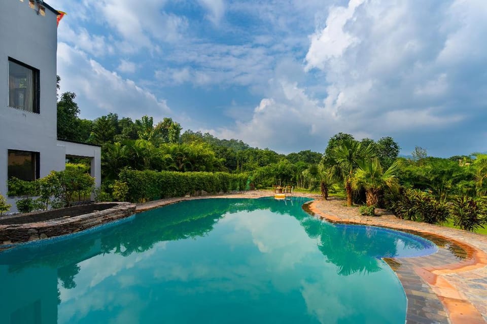 Corbett Wild Resort- A River Access Property Campground/ 
RV Resort in Uttarakhand