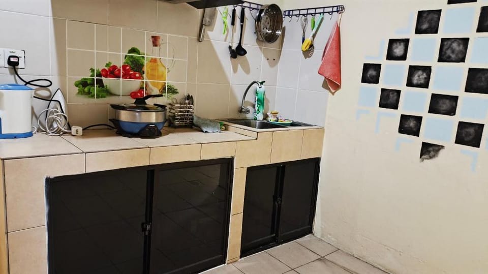 Natol Homestay - L A Tabuan Jaya Hotel in Kuching