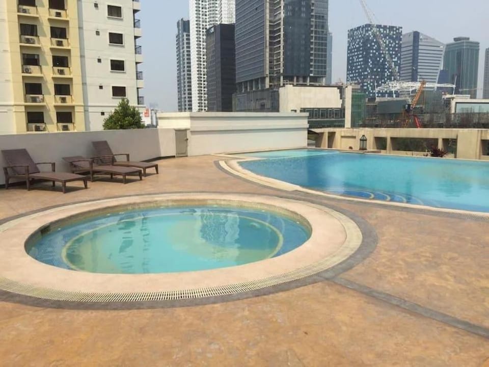 Cozy Condo at Forbeswood Parklane BGC The Fort Apartment in Makati