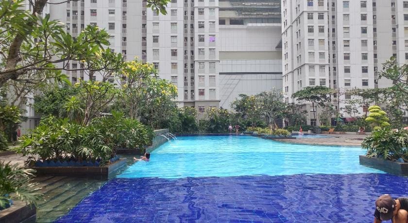 Cozy 2BR Baywalk Green Bay Apartment By Travelio Apartment in Jakarta