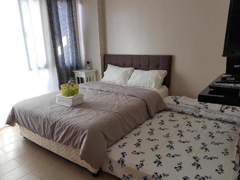 Airport Condo at Two Palm Tree Villas Apartment in Pasay
