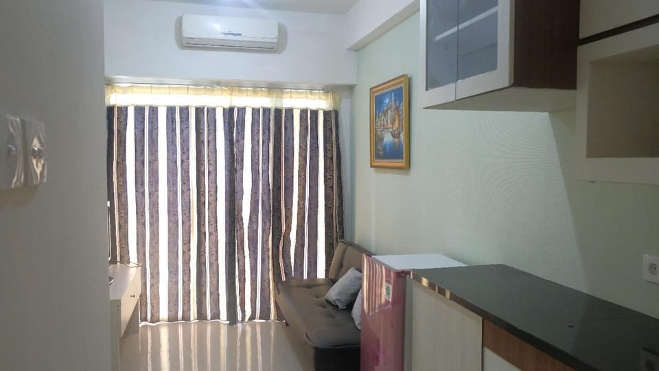 2BR Apt Tanglin above Pakuwon Mall, free wifi. GG1 Apartment in Surabaya
