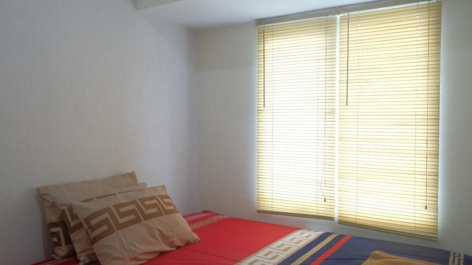 2BR Apt Tanglin above Pakuwon Mall, free wifi. GG1 Apartment in Surabaya