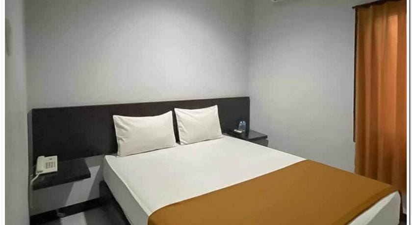 Losmen Family Syariah Bypass Juanda Mitra RedDoorz Hotel in East Java