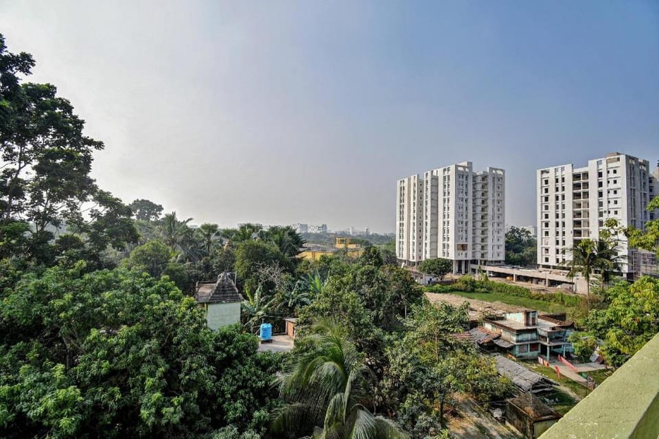 Super Hotel O V R Residency Near Sri Amruth Chithra Mandira Hotel in Bengaluru