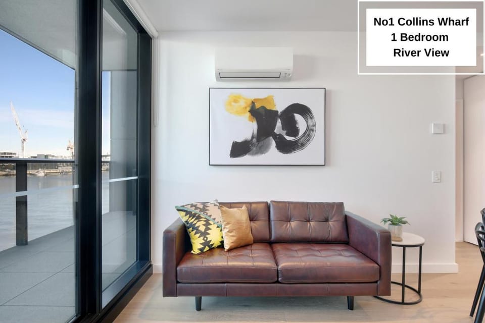 Orange Stay at Collins Wharf Apartment in Melbourne
