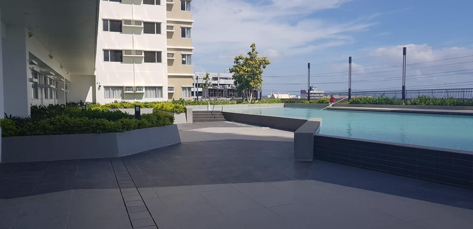 Cozy and comfy studio condo in Alabang near SLEX Apartment in Muntinlupa