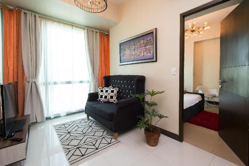 BGC 8 FORBESTOWN ROAD UNIT+WIFI READY+NETFLIX+PS4 Vacation rental in Makati