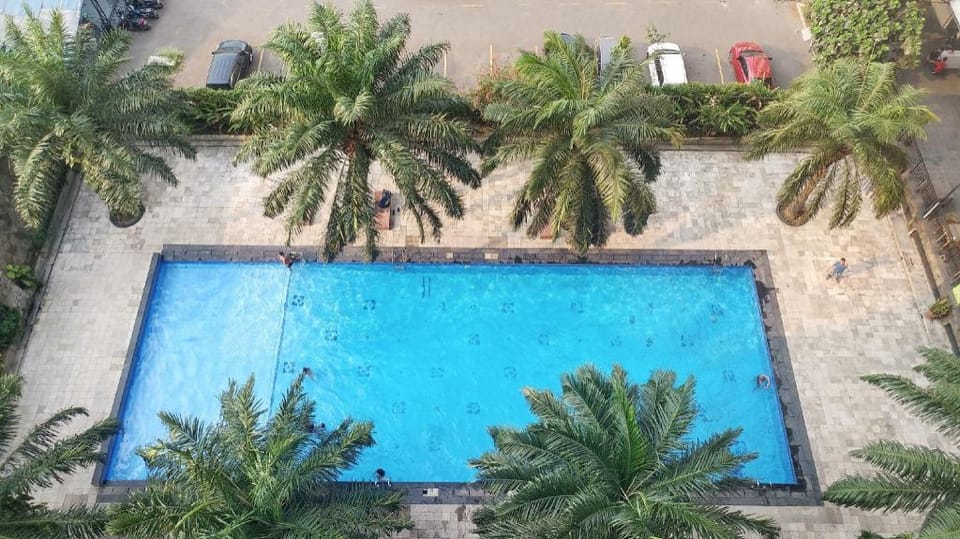 Relaxing 2BR Mutiara Bekasi Apartment By Travelio Apartment in West Java
