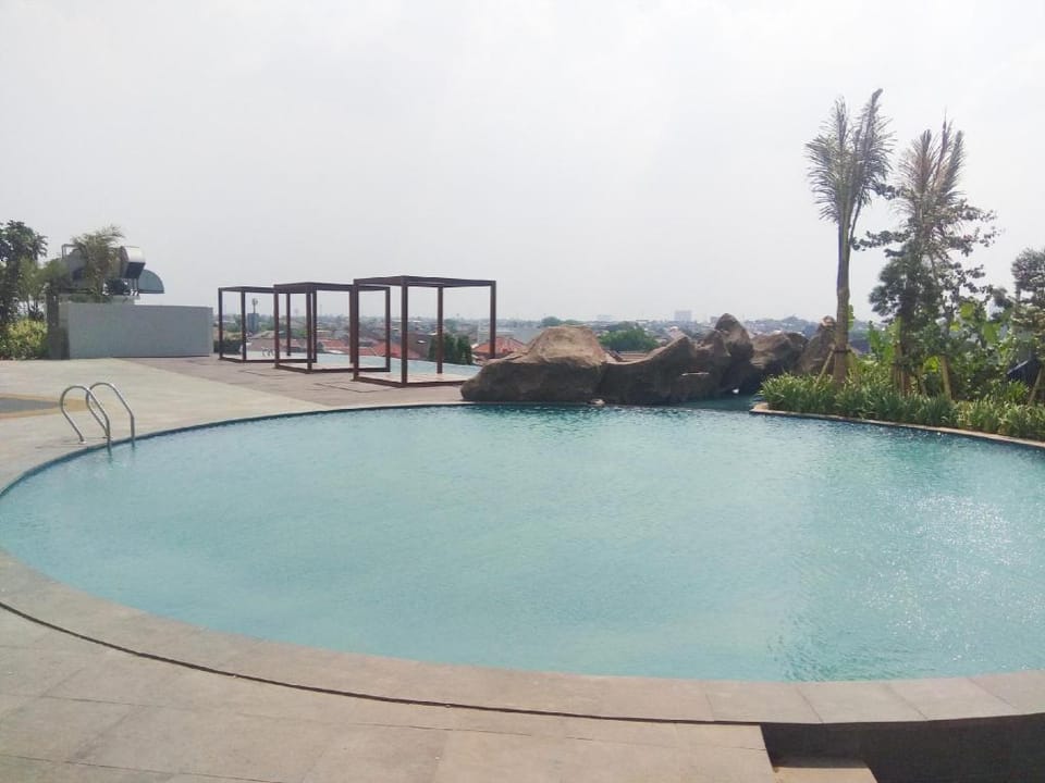 Elegant Studio Grand Kamala Lagoon Apt By Travelio Apartment in West Java
