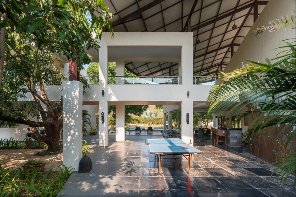 The Leaf by StayVista - An enchanting escape offering a pool, terrace, lush lawn, contemporary interiors, and indoor games Villa in Maharashtra