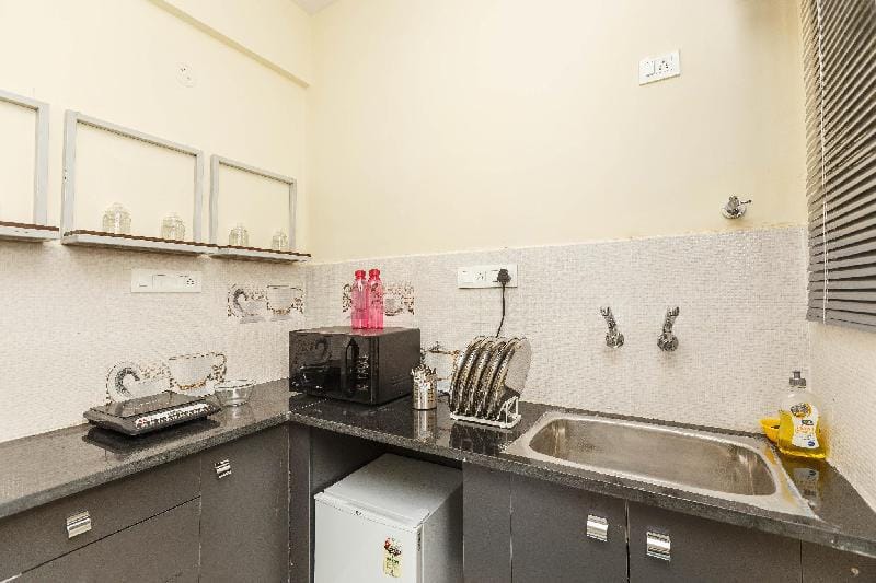 Home Awaits | 1.5 BHK with Wi-Fi & HouseKeeping Apartment in Bengaluru