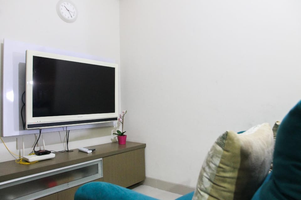 Balcony 1BR at The Oasis Cikarang Apt By Travelio Apartment in West Java