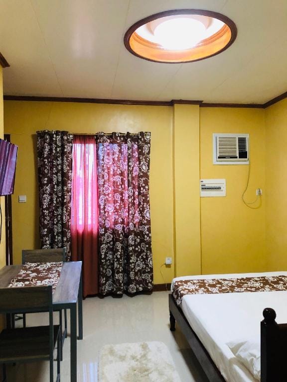 NRR room 3-clean with private bath, A/C, frontview Apartment in Caraga