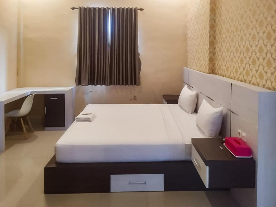 RedDoorz Syariah near Sultan Syarif Kasim II Airport Hotel in West Sumatra, Indonesia