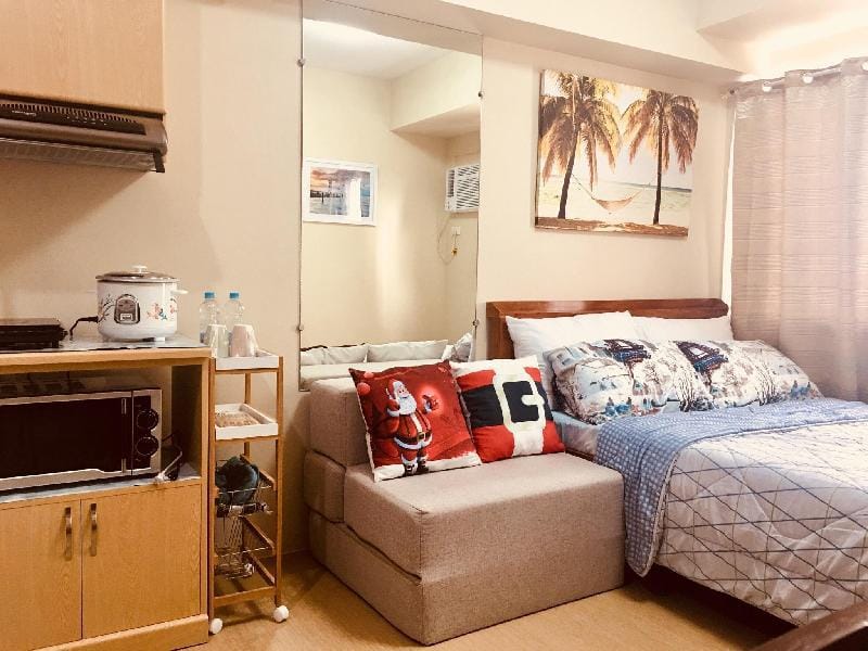 Cozy Avida Aspira w/ Netflix,, cable & WIFI Apartment in Cagayan de Oro