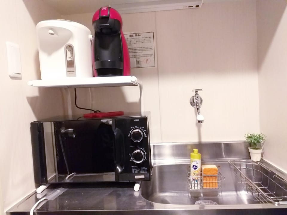 Shin-Osaka 1-min walk/Cozy JPN Apt. room/Free WiFi Apartment in Osaka