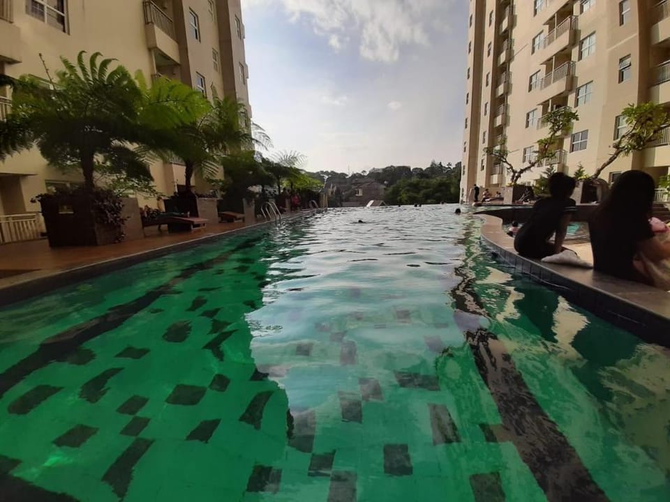 Homey Staycation | Parahyangan Residence Apartment in Parongpong
