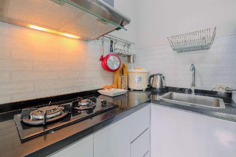 Minimalist 1BR The Oasis Cikarang Apt By Travelio Apartment in West Java
