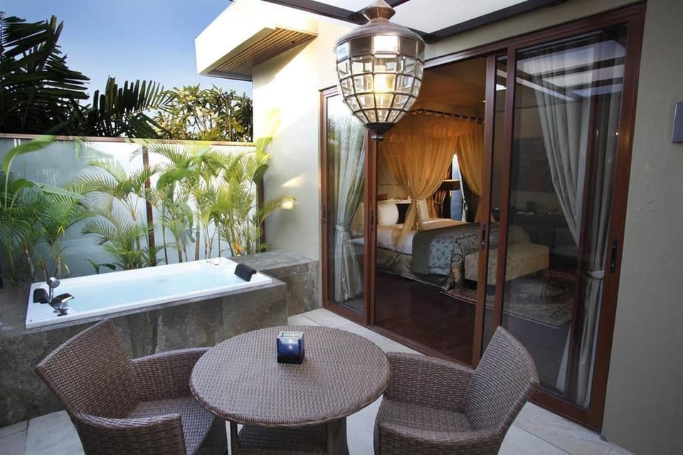 Suite 1 BR with Private Jacuzzi Seminyak NE99A Villa in Kuta