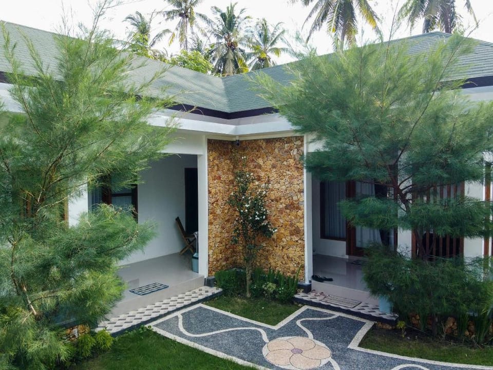 Ben Homestay Kuta Lombok( Family Room) Vacation rental in Pujut