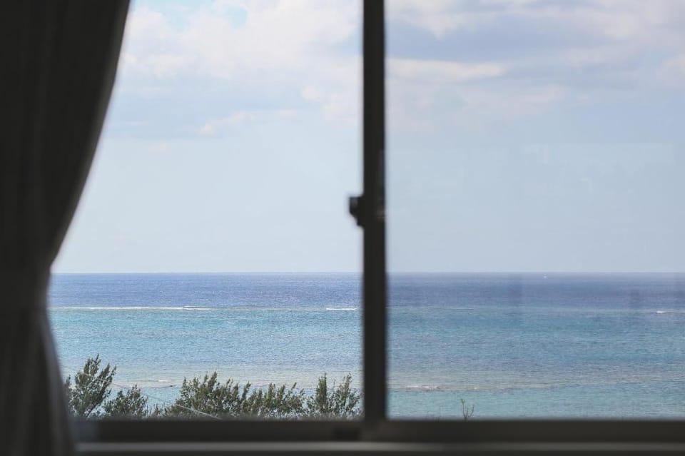 l★1日1組限定！全室オーシャンビュー＆露天風呂からの夕日が絶景！16名まで/無人ホテル Vacation rental in Okinawa Prefecture