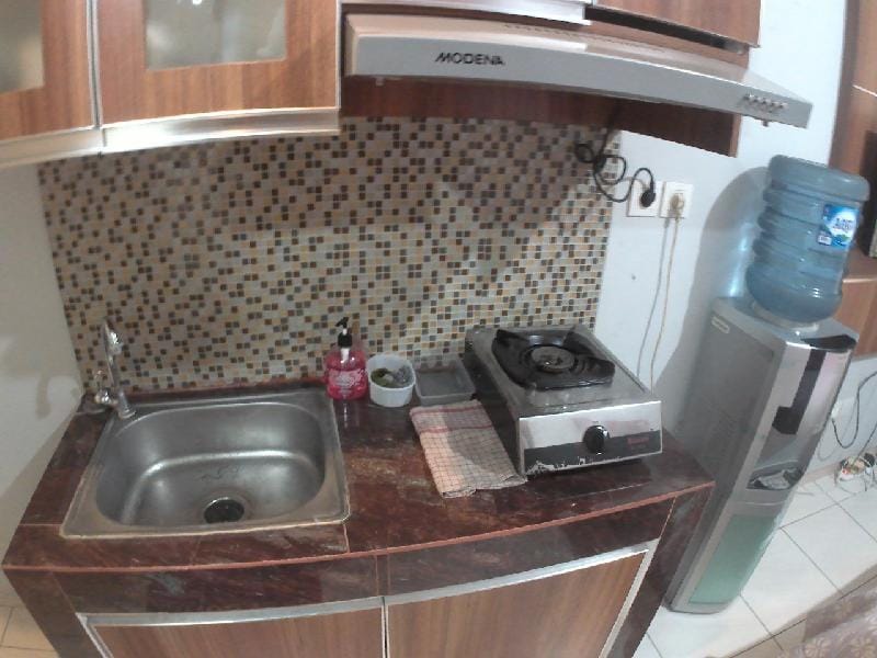 Homey Studio MDN Furnish Springlake Summarecon CBD Apartment in West Java