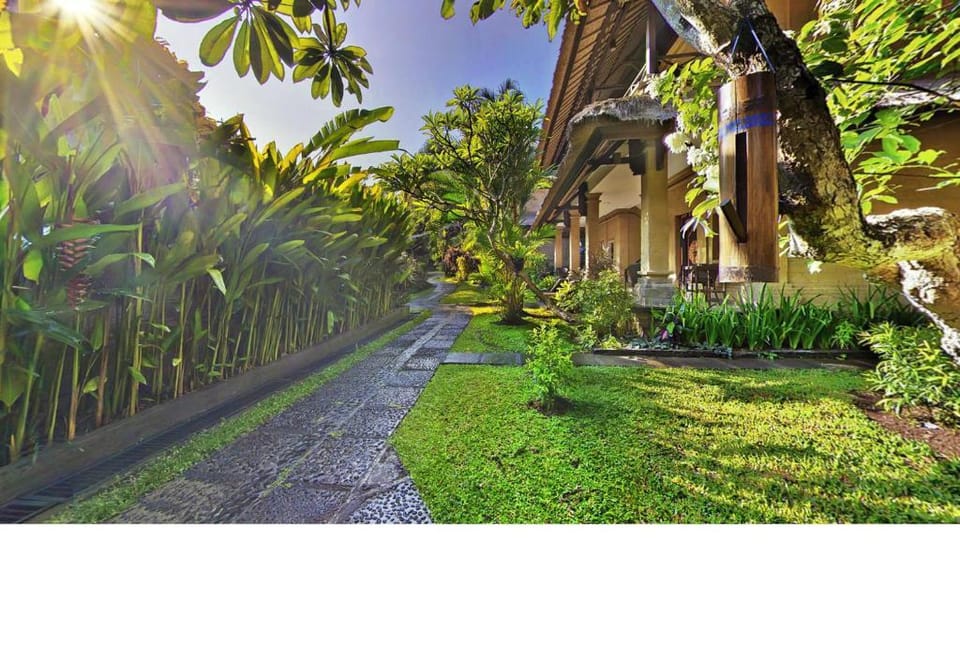 Cozy Standard Room With Garden View SU59 Apartment in Kuta