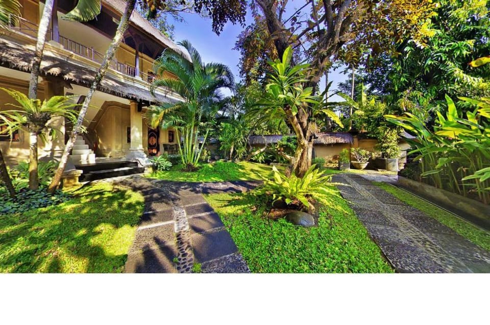 Cozy Standard Room With Garden View SU59 Apartment in Kuta