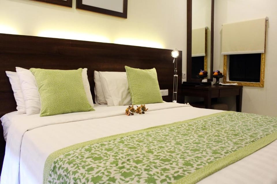 Cozy Standard Room With Garden View SU59 Apartment in Kuta